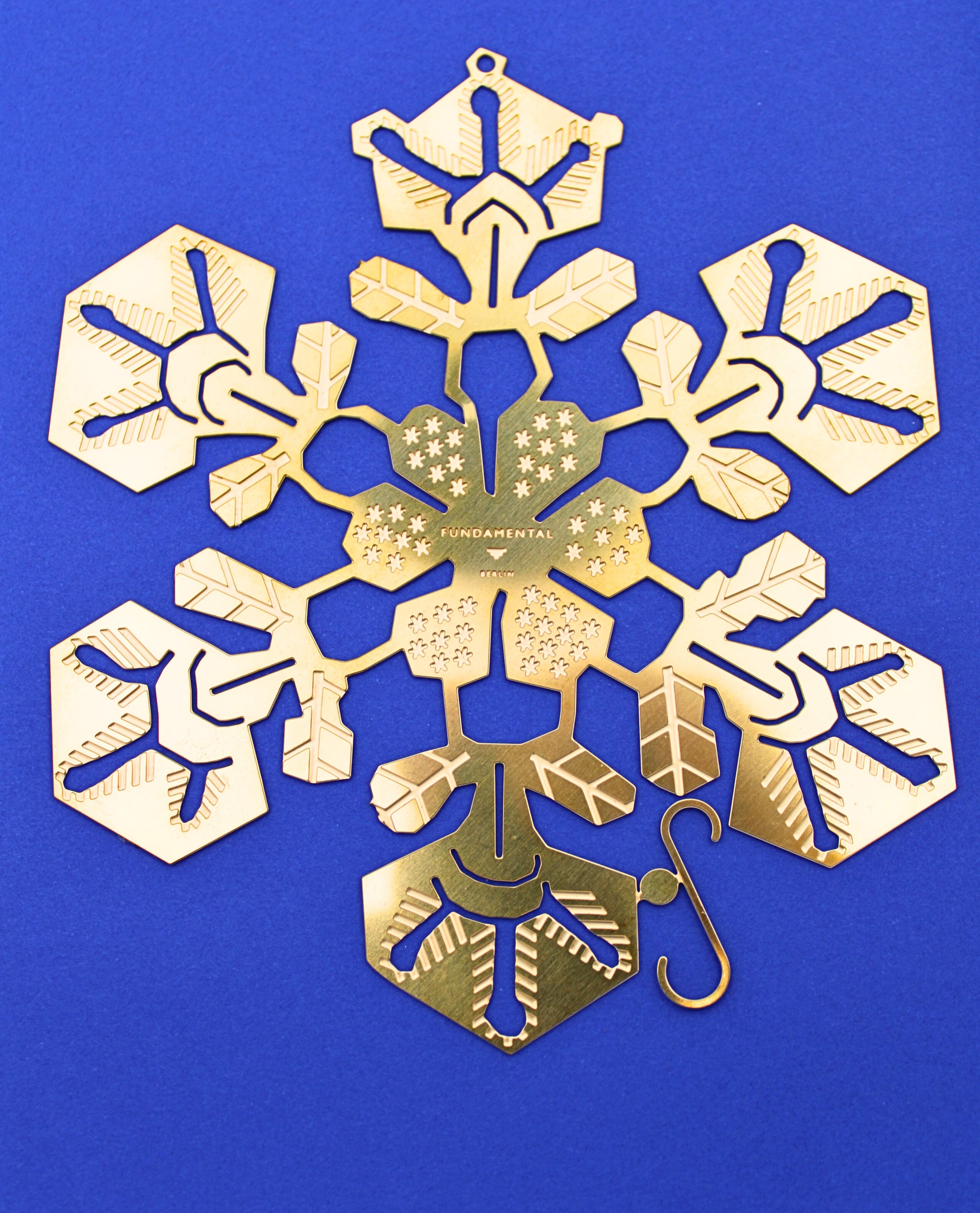 Close up detail of Brass Snowflake Decoration