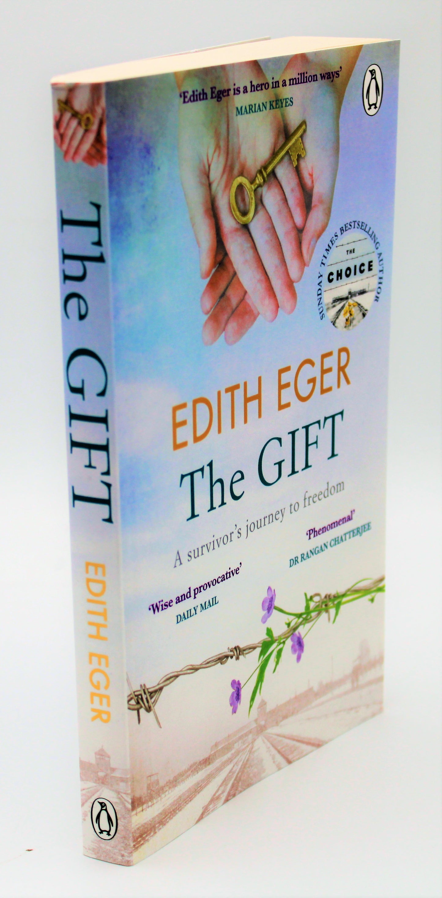 Side View of The Gift: A Survivor's Journey to Freedom Paperback Book